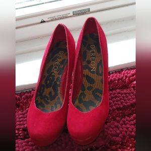 A pair of suede red Dereon high heels
